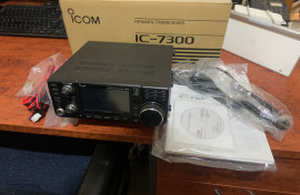 Icom IC7300 in box with optional carry handle.