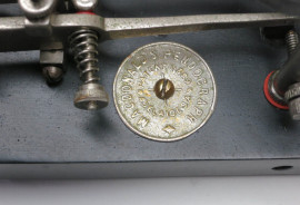 Round nameplate for Pendograph bug